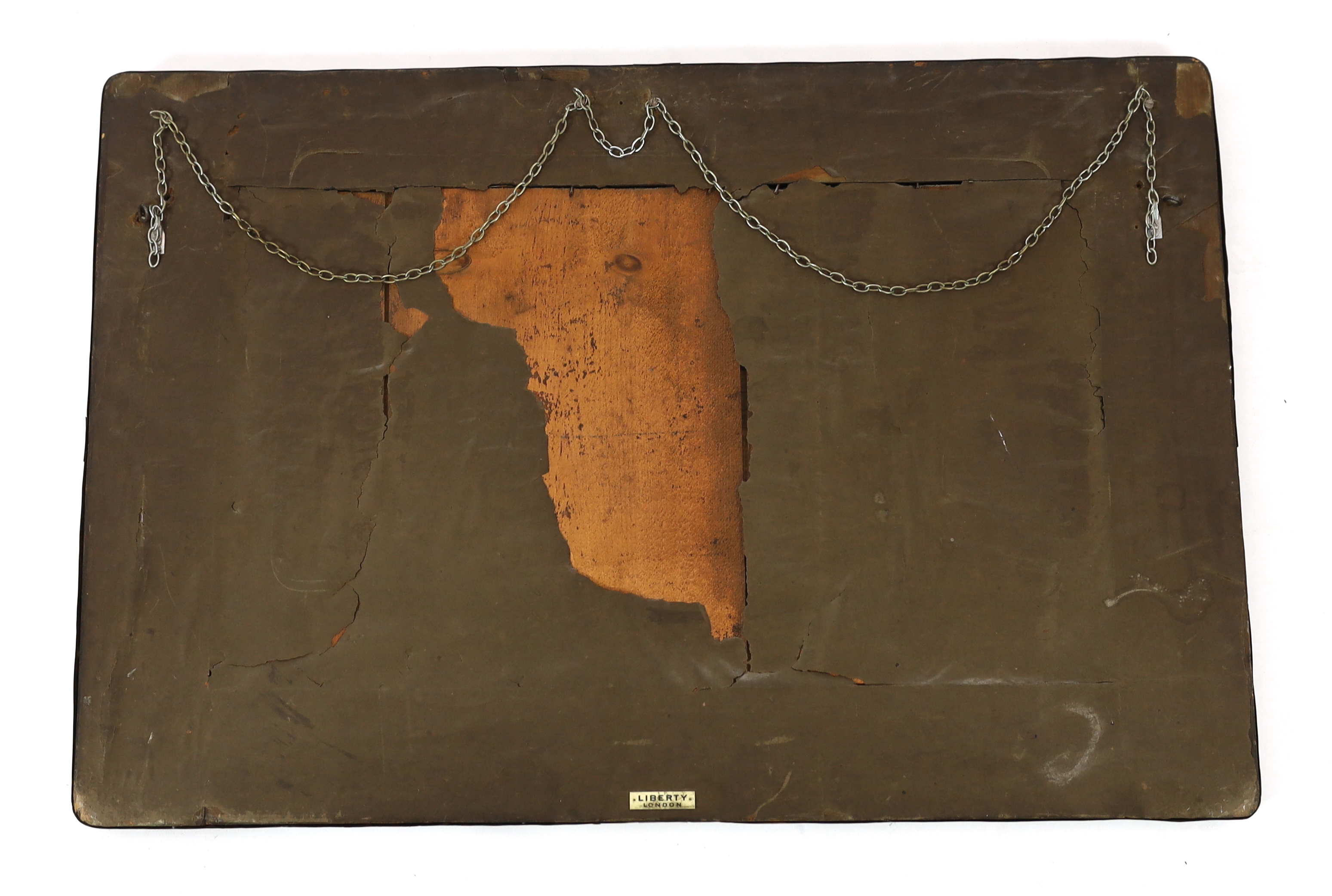 A Liberty Arts & Crafts embossed copper and 'Ruskin stone' wall mirror, designed by Archibald Knox, 91.5cm wide, 61cm high